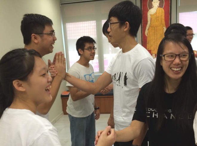 Youths get acquainted during the ice-breaking session. 