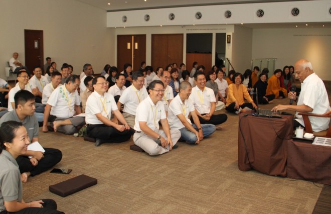 Achariya Vijaya giving a Dhamma talk.