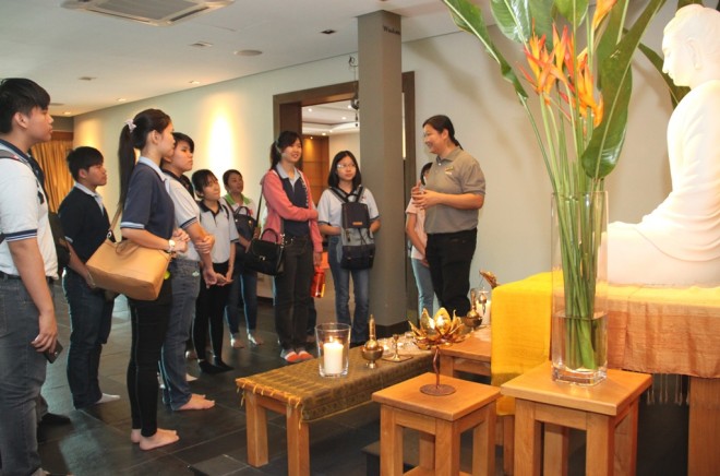 Sis. Buddhini takes some of the students on a tour of the Centre.