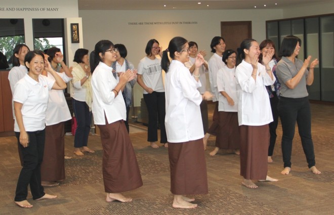 Participants giving a group presentation.