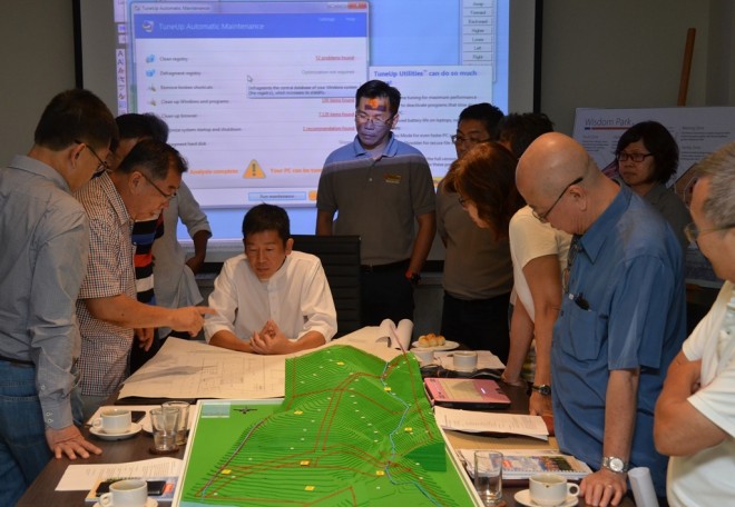 The architectural team presenting the proposed first phase of construction.