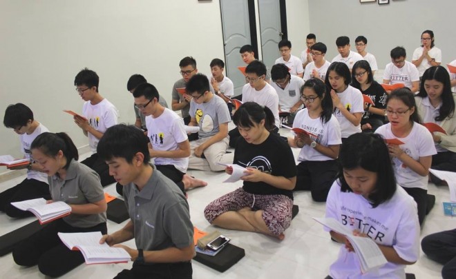Youths beginning their morning service with chanting. It was a full-house at the Nalanda Youth Centre.
