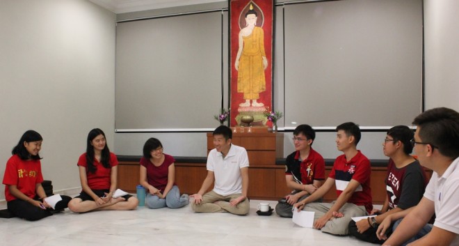Bro. Tan sharing with the youths on being discerning in their choice of activities.
