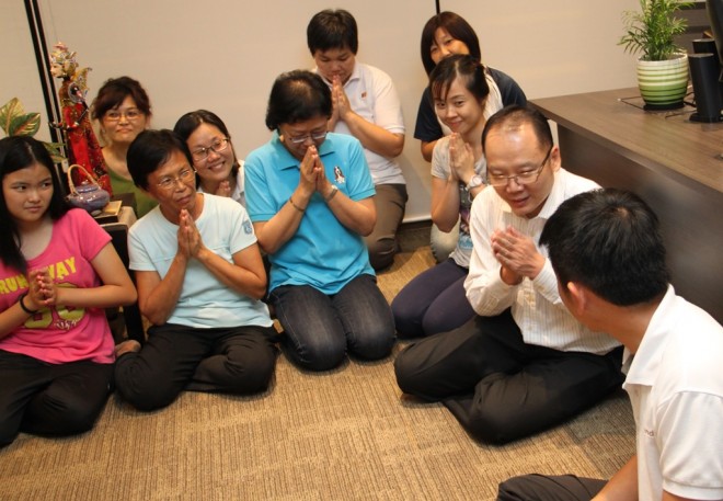 Kuala Lumpur branch officers greeting Bro. Tan.