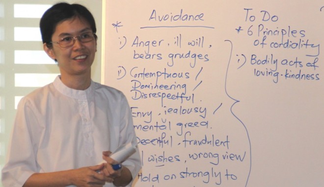 Sis. Santi giving a Dhamma sharing on how to avoid conflict.