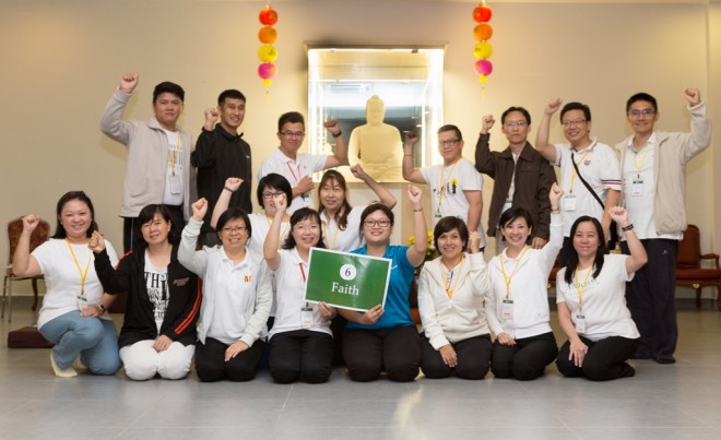 The participants were divided into 12 groups such as Team 'Faith' for group discussion after each Dhamma session.