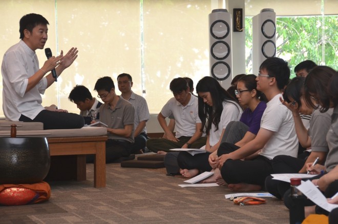 Bro. Tan giving a sharing as a follow-up to the recent camp's Dhamma sessions.