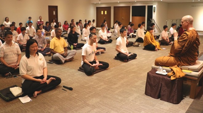 Ajahn Chandako conducting the weekly  meditation session at Nalanda Centre.