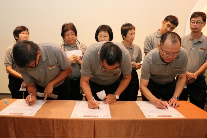 Branch Chairmen signing their pledge.