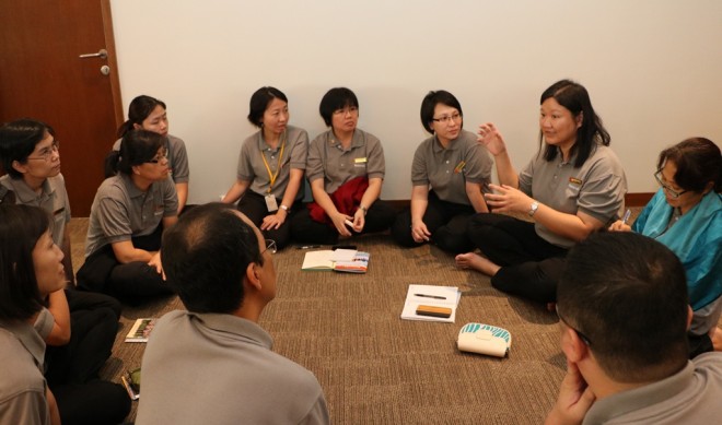 Officers having group discussions.