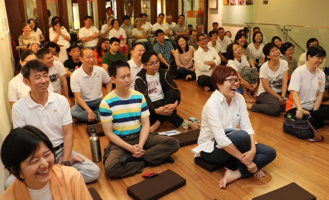 Participants are joyful listening to Achariya Vijaya's talk.