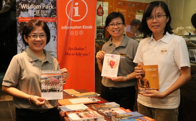 Guests who came for the Wesak eve Dhamma talk were greeted with a warm welcome and smiles.