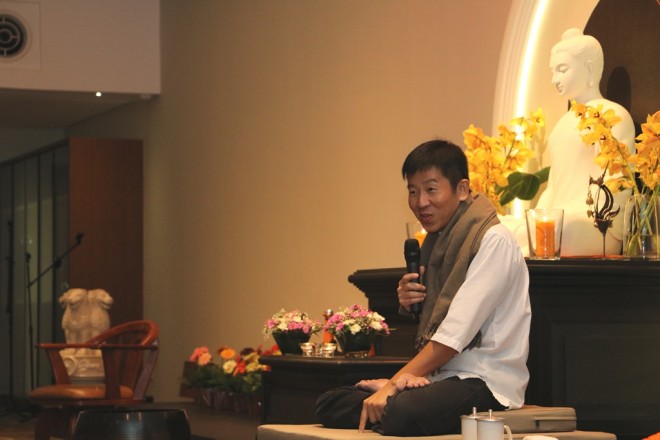 Bro. Tan giving a Dhamma talk on honouring the Buddha spiritually during Wesak.