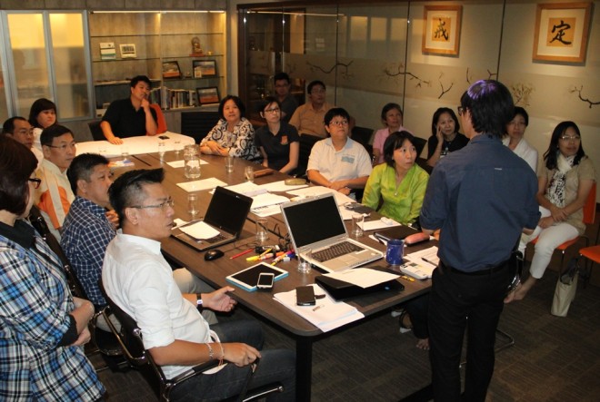 Head of Programme Committee Bro. Nicholas briefing the organising team on the performances to be staged on that day.