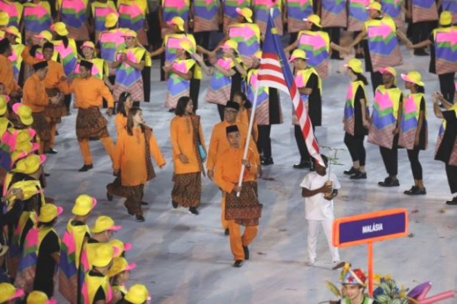 The Malaysian contingent entering the Maracana Stadium at the Opening Ceremony.