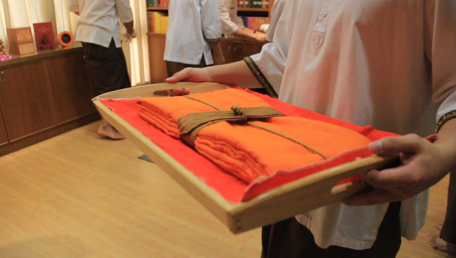 The robe was then taken out of its case and brought over to Nalanda House.