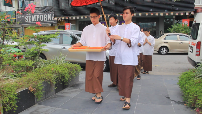 Student captains led the short walk from Nalanda Centre to Nalanda House opposite the road.