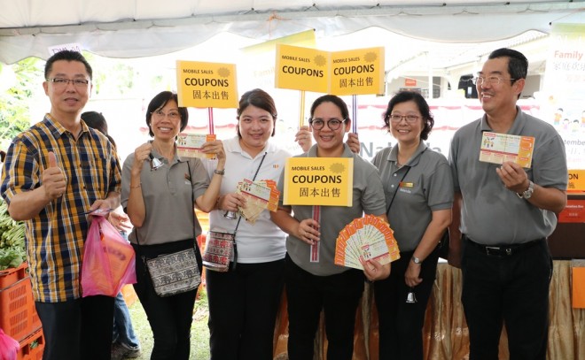 Energetic coupon sales volunteers.