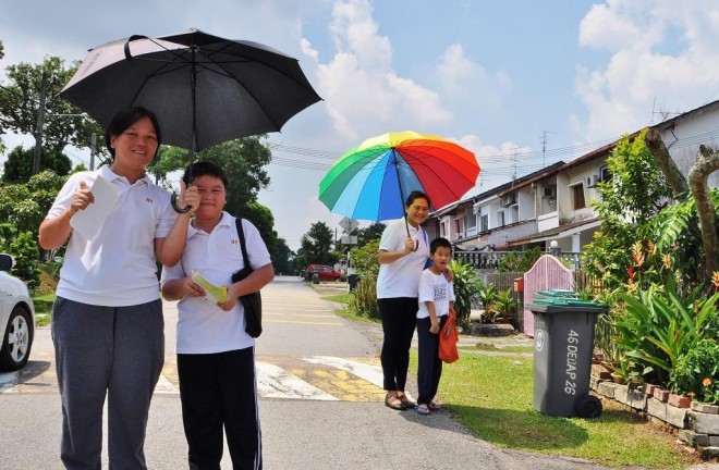 Promoting the fund-raising event from door-to-door.