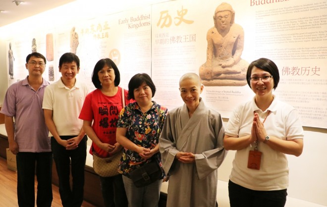 Bhikshuni Tian Yuan and three devotees from Chze Earn Temple. 
