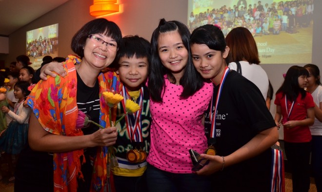 Students happily received their prizes and awards.