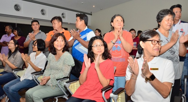 Parents and students giving Nalanda Free School teachers a standing ovation.