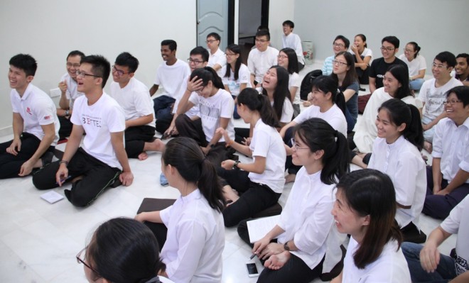 Laughter ringing throughout the Youth Centre during Bro. Tan's teaching.  