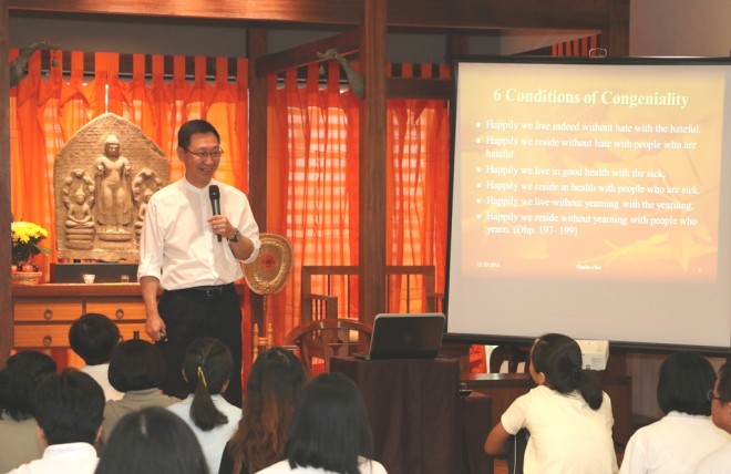 Dato’ Charlie Chia speaking on the important topic of living in harmony.