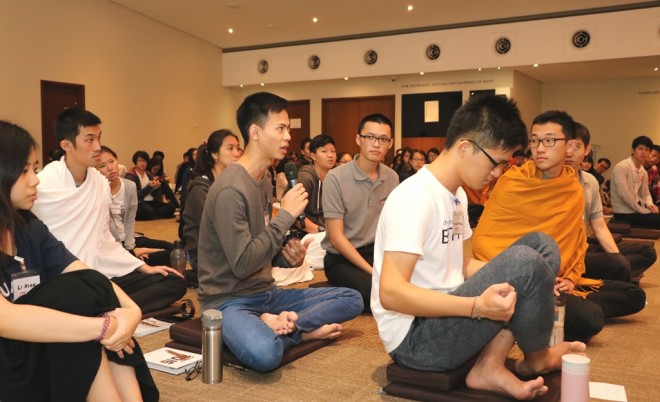 Asking questions to clarify learning during the Q&A session.