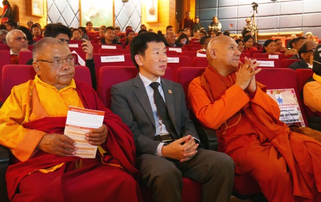 8Listening to other speakers with Ven. Lama Lobzang and Ven. Sanghasena Mahathera.