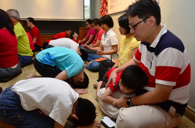 Children paying deep respects to their parents.