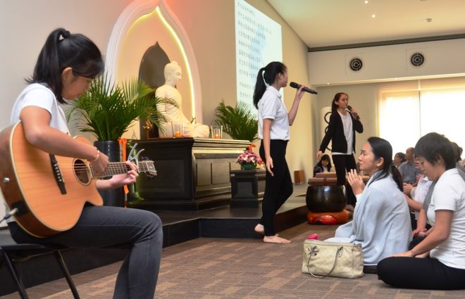 Students of Nalanda Dhamma School presenting a lively Mandarin song.